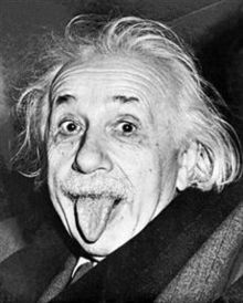 Einstein poking his tongue out at a reporter. 