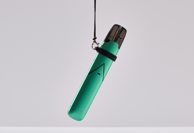 Green Hexa Pro hanging from a lanyard. 