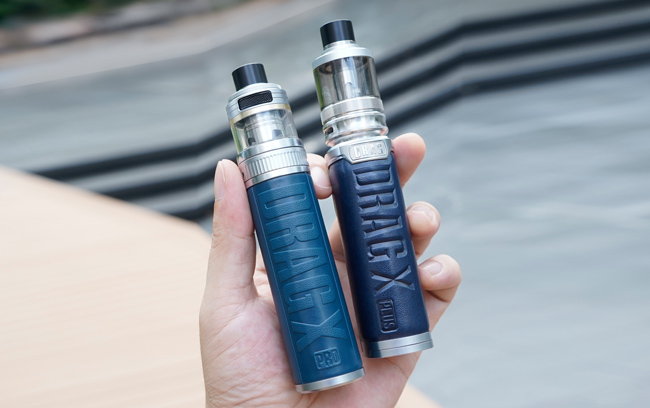 Drag X Pro and Drag X Plus side by side in hand. 