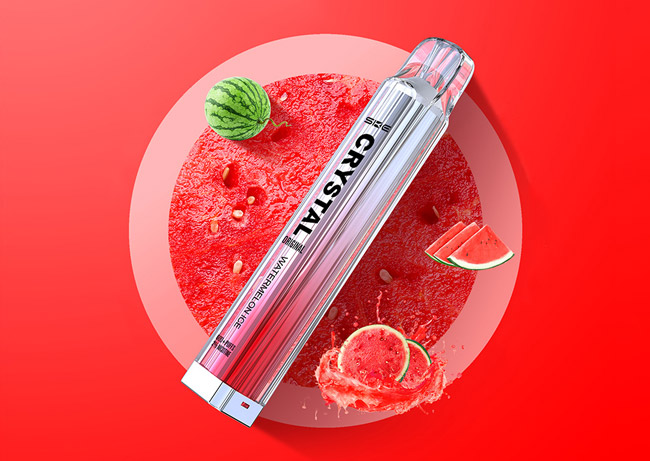 Image of an SKE Crystal Bar disposable vape surrounded by strawberries